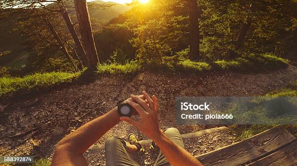 Pov Trail Running In The Forest Checking Smart Watch Stock Photo - Download Image Now