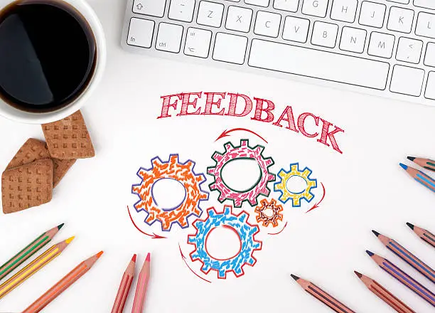 Photo of Gears and Feedback Mechanism on White office desk