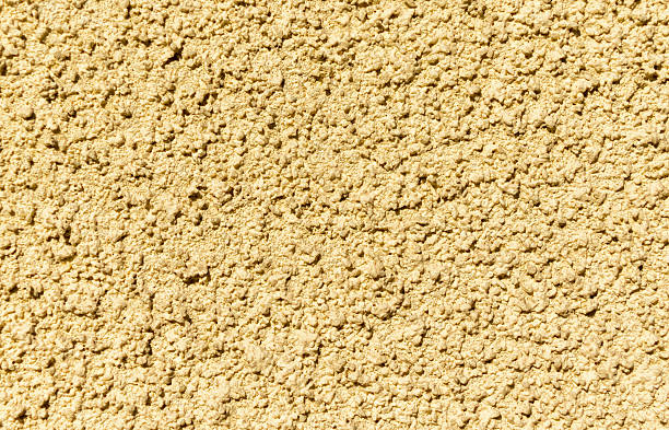 istock Plastered painted surface in form of scribbled frozen concrete drops 588575344