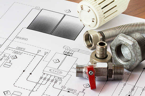 scrivania ufficio con raccordi idraulici e progetto - hydraulics foto e immagini stock