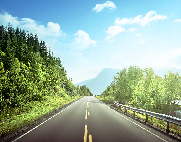 istock summer road in mountain,  Norway 588578866
