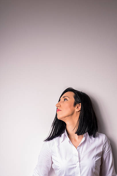 istock Beautiful young woman relaxing 588579008
