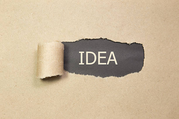 istock The text Idea appearing behind torn brown paper 588579204