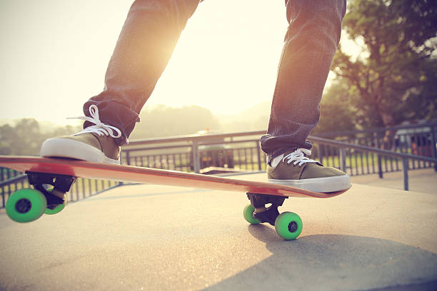 istock young skateboarder legs skateboarding at skatepark 588579618