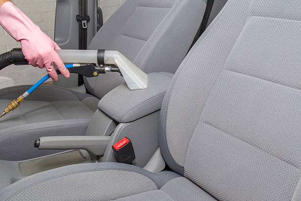 istock Clean car interior after light gray textile seats chemical cleaning. 588579784