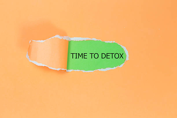 istock time to detox written under torn paper 588580158