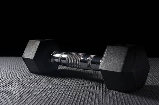 istock Dumbbell on mat,sport equipment. 588587314