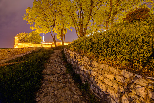 Belgrade medieval walls of fortress and park at night, Serbia
