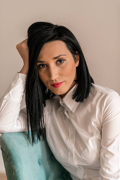 istock Beautiful young woman relaxing 588588140