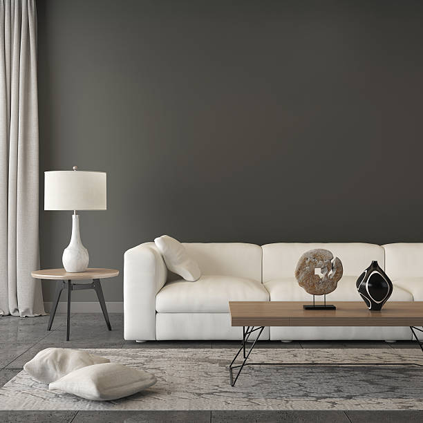 istock Close view at a white sofa with a  table lamp 588590396