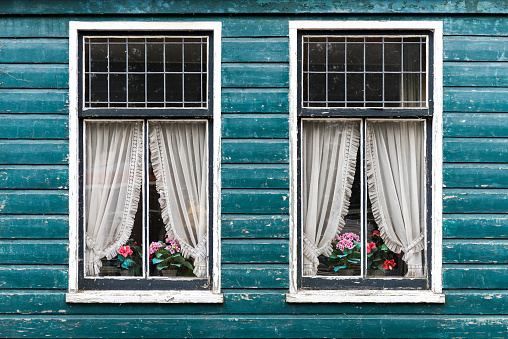Old house windows in Amsterdam, Netherlands.