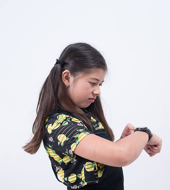 istock asian girl waiting 588593370