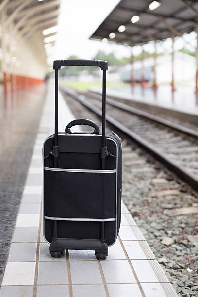 istock luggage bag on platform at train station 588594182