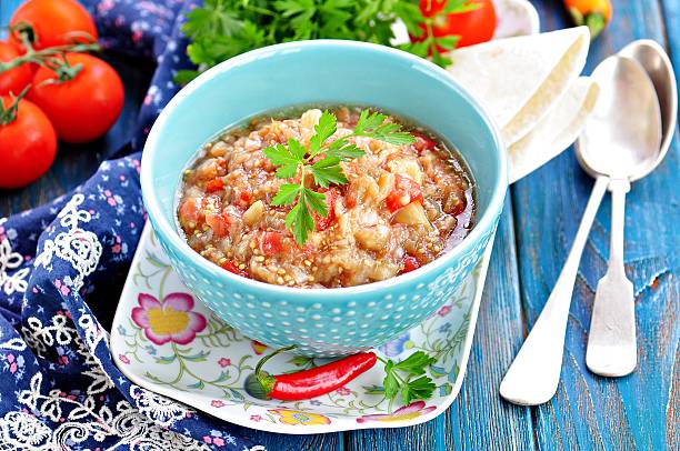 istock Baba ganoush salad with eggplant, tomato, onion, olive oil 588595232