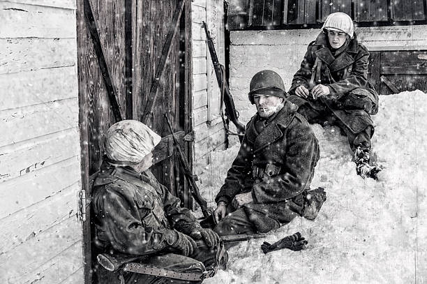 istock WWII US Infantry Soldiers Sheltering During A Winter Storm 588596828