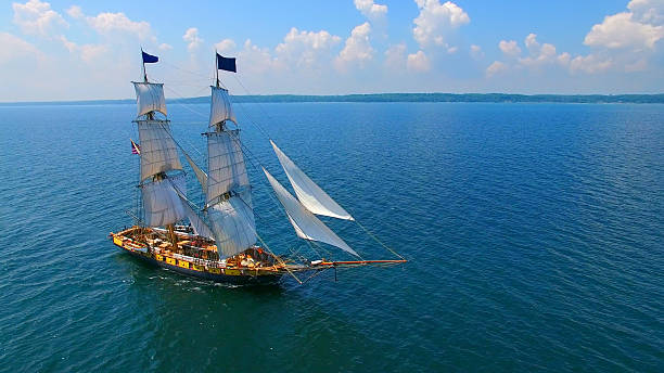 istock Tall sailing ship sailing off to distant shores 588597302