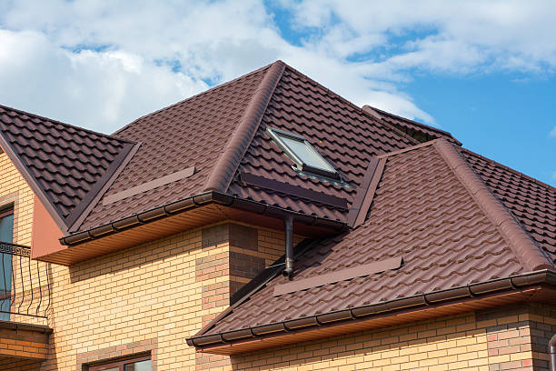 istock Multilevel roof with attic skylights, snow guards, rain gutter 588598426