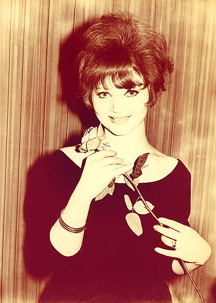 istock Vintage beautiful girl with a flower 588600264