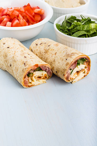 istock Wrap with tomato, lettuce, harissa and hoummous. 588601290