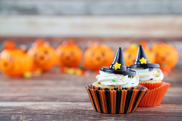 Halloween halloween halloween cupcake stock pictures, royalty-free photos & images