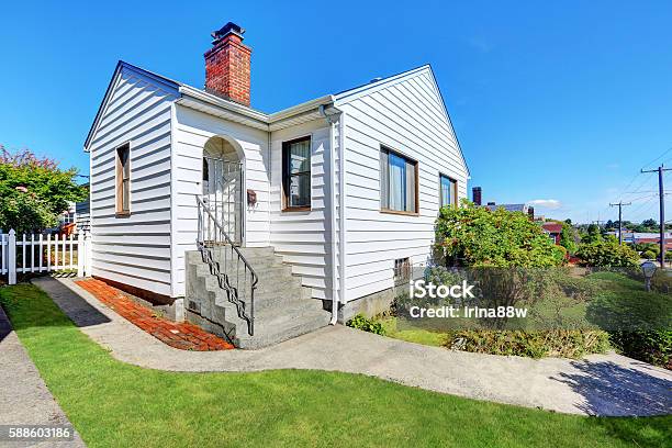 Cute Small American House With White Exterior Paint Stock Photo - Download Image Now