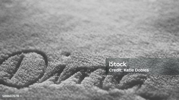 Name Dina Text Carved In Snow Background Wallpaper Stock Photo - Download  Image Now - Black And White, Carving - Craft Product, Copy Space - iStock