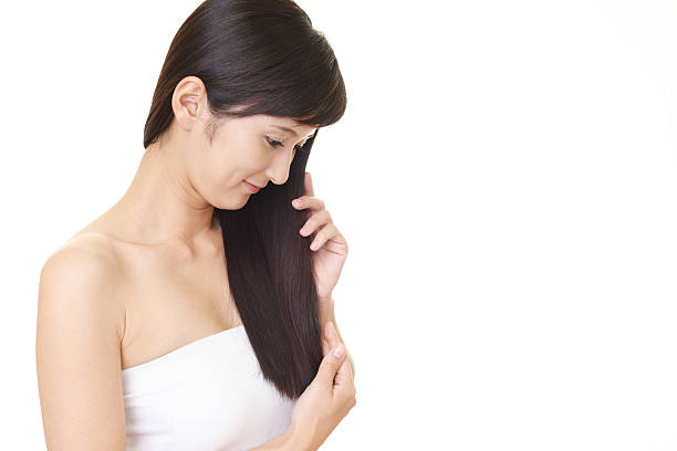 istock Woman with beautiful long hair 588607396