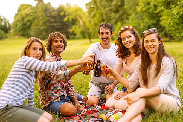 istock Celebrating friendship in nature on camping 588607446