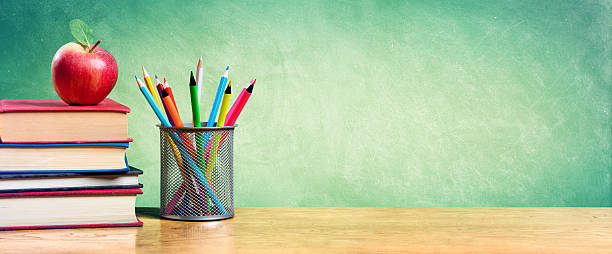 Back To School With Apple On Books And Colorful pencils