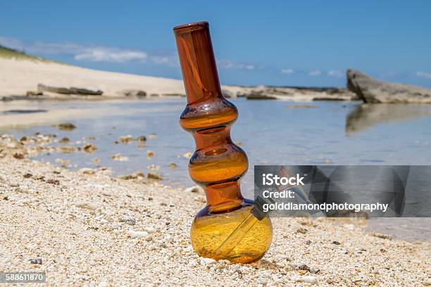 Centered Bong On The Beach Stock Photo - Download Image Now - Bong, Backgrounds, Beach