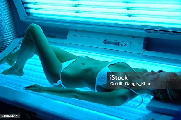 Woman Getting Solarium Beauty Treatment Stock Photo - Download Image Now - Tanning Bed, Sun Tan, Sunbathing