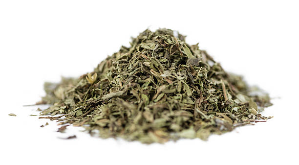 istock Dried Stevia leaves isolated on white 588614394