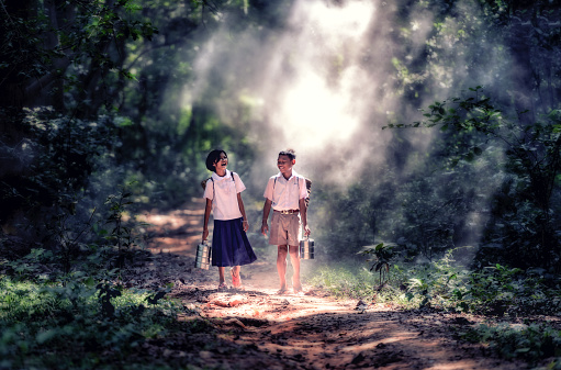 Student little asian boy and girl, countryside in Thailand