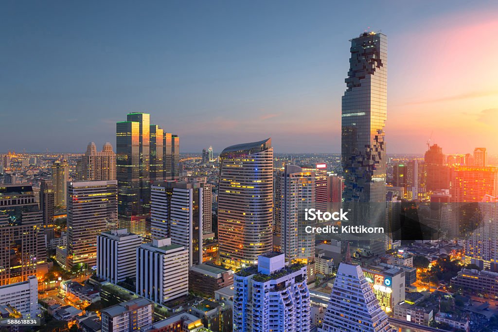 Aerial view of Bangkok modern office buildings, condominium Aerial view of Bangkok modern office buildings, condominium in Bangkok city downtown,Mahanakorn tower with sunset sky , Bangkok , Thailand Bangkok Stock Photo