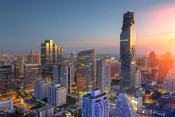 Aerial view of Bangkok modern office buildings, condominium Aerial view of Bangkok modern office buildings, condominium in Bangkok city downtown,Mahanakorn tower with sunset sky , Bangkok , Thailand southeast asia stock pictures, royalty-free photos & images