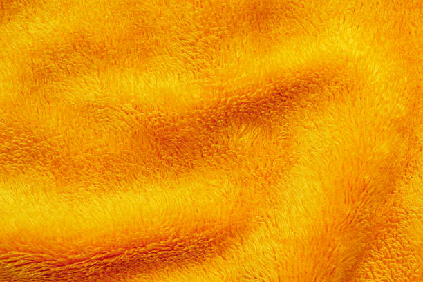 istock Gold curled shag carpet detail 588620062