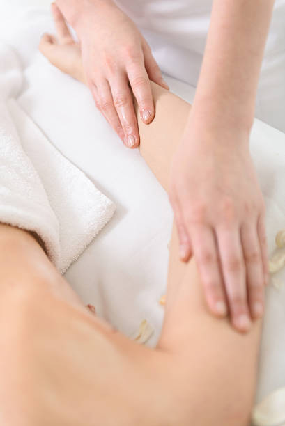istock Professional beautician making massage of human hand 588621572