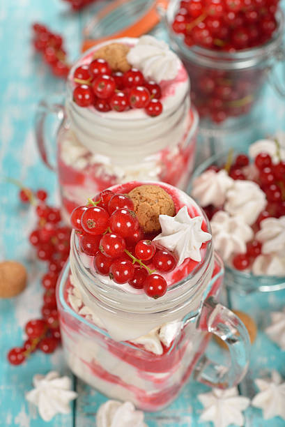 istock Dessert with red currant and whipped cream 588622664