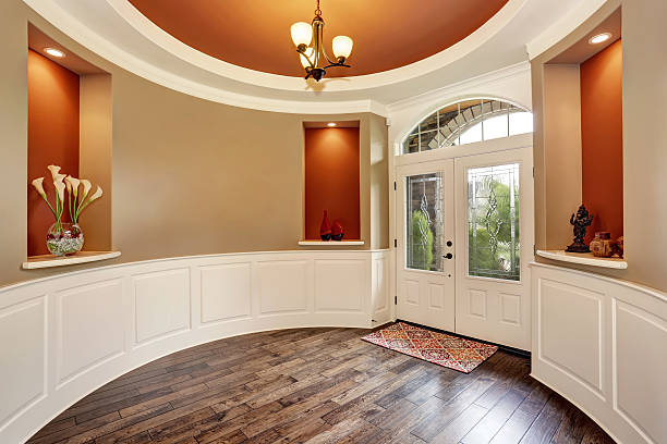 istock Gorgeous entryway with round red walls and nice decor 588625634