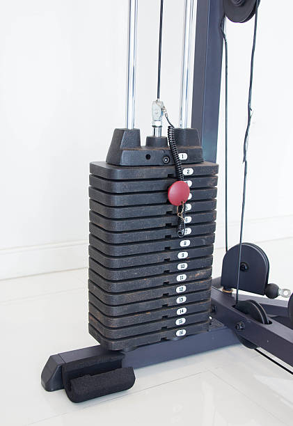 istock Stack Metal Weights In Gym Equipment As Bodybuilding Concept 588955474