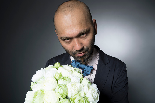 Men of skin head to have a bouquet
