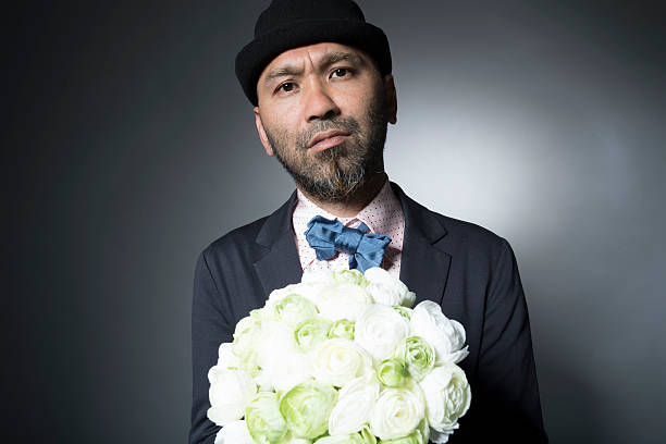 Men to propose with a bouquet of flowers