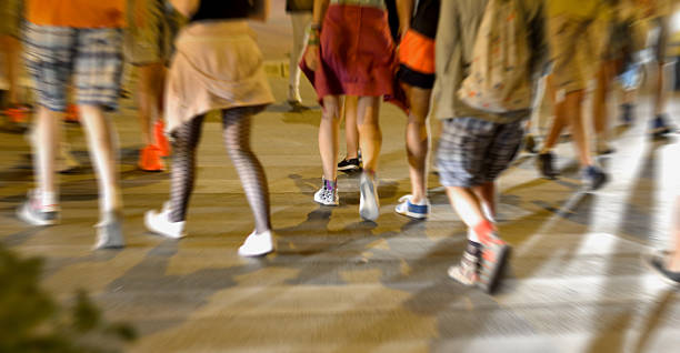 istock Pedestrians on Zebra and Motion Blur 588957420
