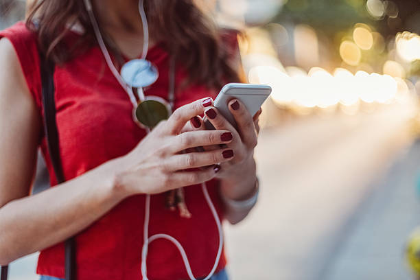 istock Texting at the street 588957518