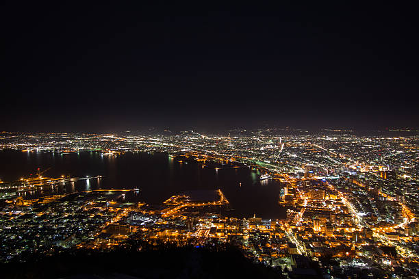 vista noturna de inverno do porto de hakodate - harbor pilot - fotografias e filmes do acervo