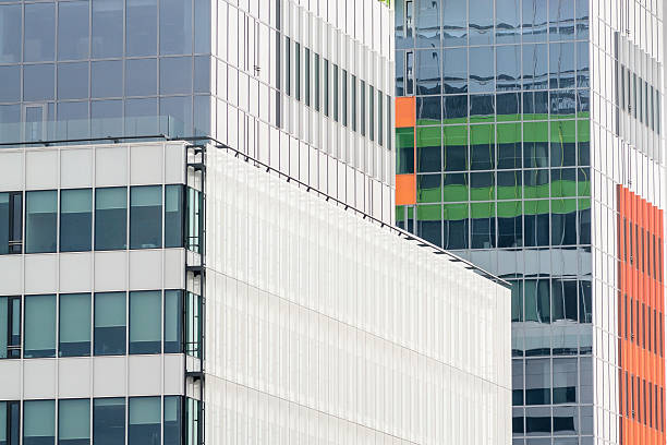 istock Windows of a modern business building exterior. Horizontal image 588958304