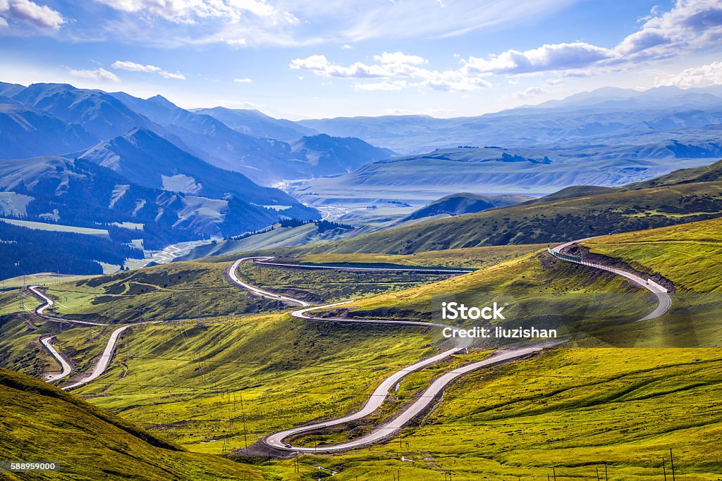 The rugged mountain road. Long Stock Photo