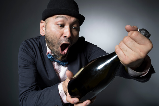Men are surprised to champagne labels