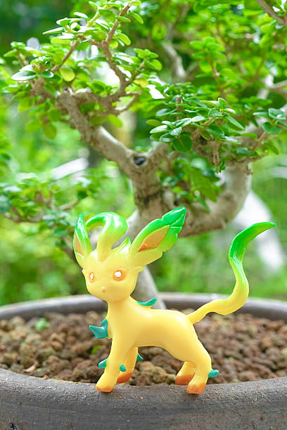 Bangkok, Thailand - August 13, 2016 : Photo of grass type Pokemon miniature called Leafeon (or Leafia in Japanese), evolved from Eevie. Eevie is 1 of the most popular characters from Pokemon animation. Concept of hunting Pokemon for Pokemon Go game just launched in July 2016 worldwide.