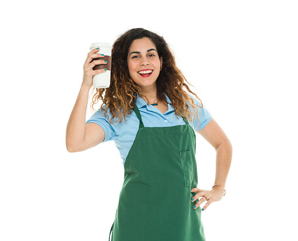 istock Smiling barista holding coffee cup 588961598